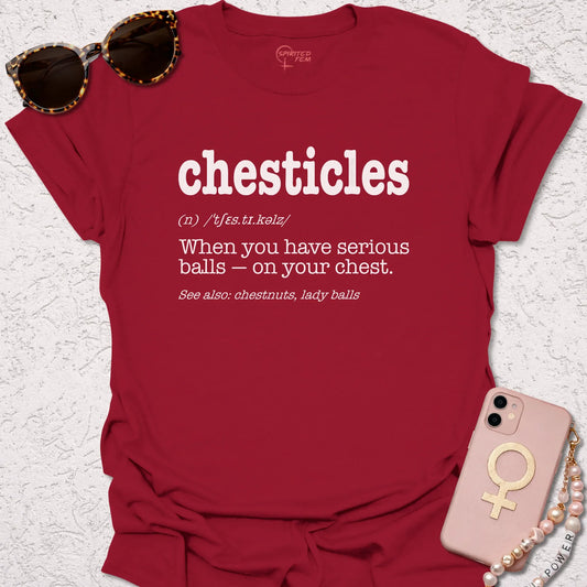 Red t-shirt with the word Chesticles in white followed by the definition